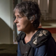 Carol (Melissa McBride) ponders whether Henry needs to look at some flowers.